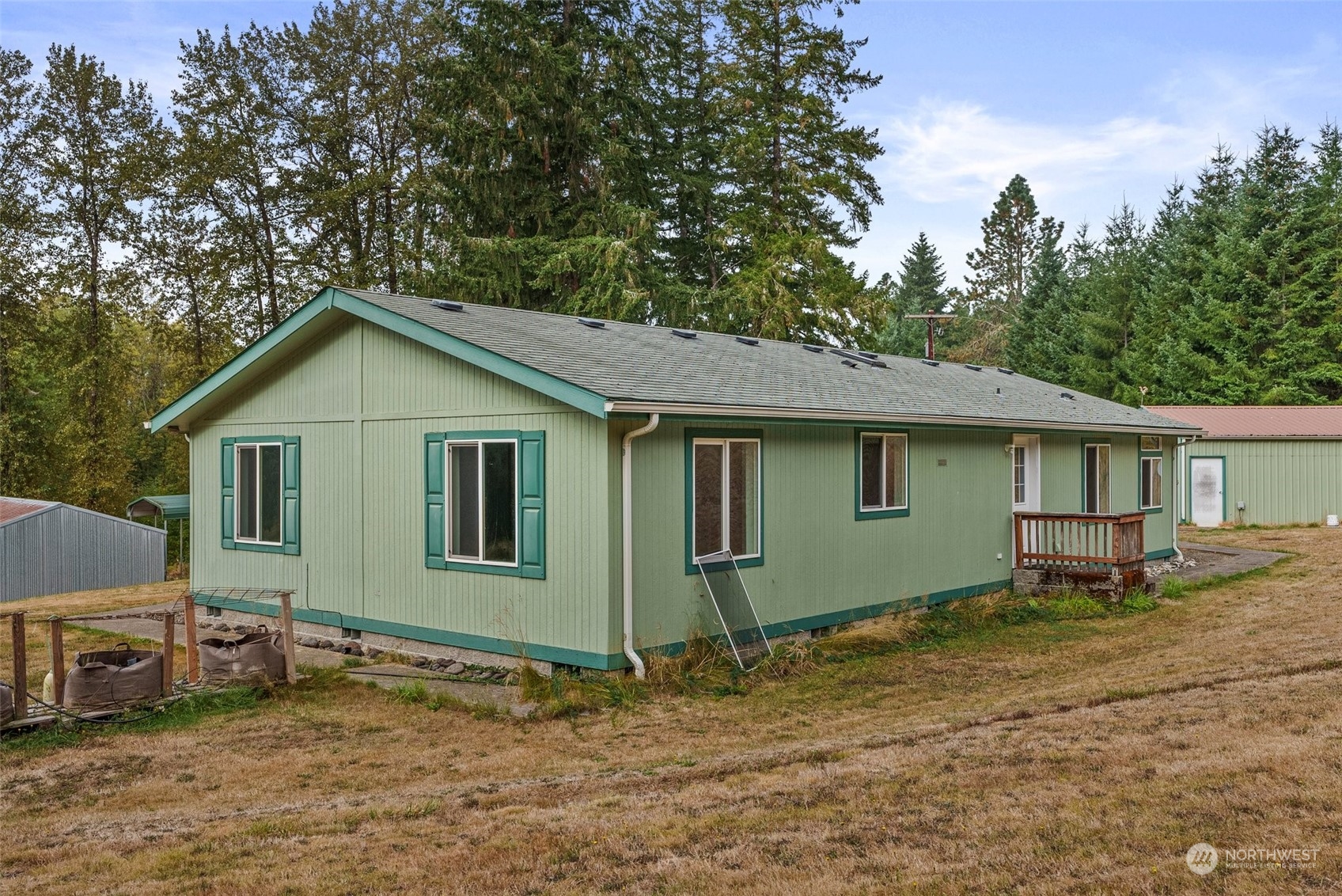 144 Aumick Road Winlock, WA 98596 - Photo 23 of 35 a view of a house with a yard