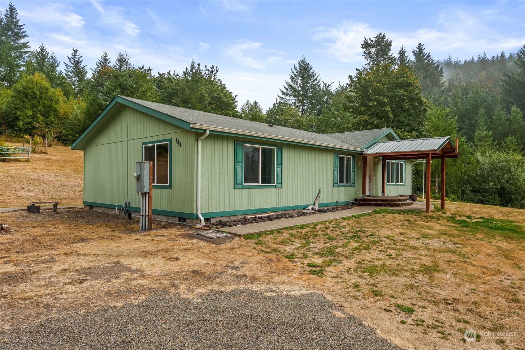 144 Aumick Road Winlock, WA 98596 - Photo 3 of 35 a view of a house with a yard