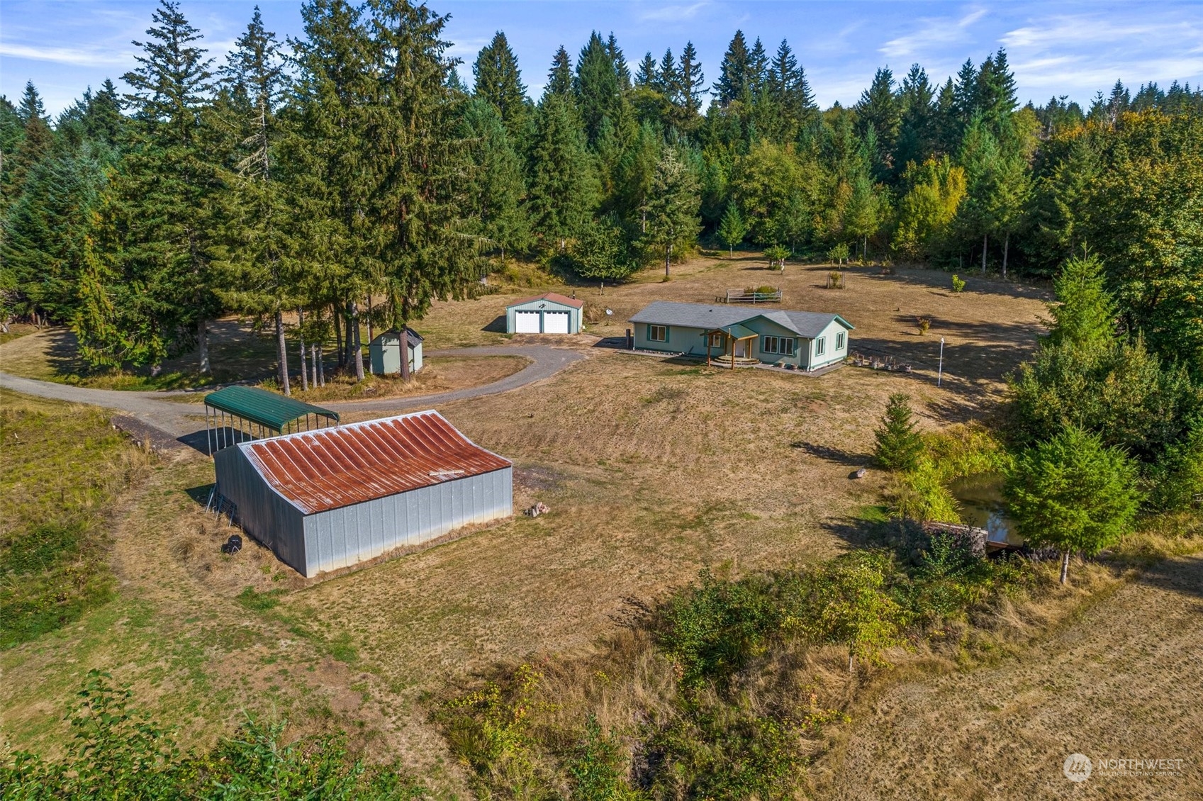 144 Aumick Road Winlock, WA 98596 - Photo 35 of 35 a view of a backyard with swimming pool
