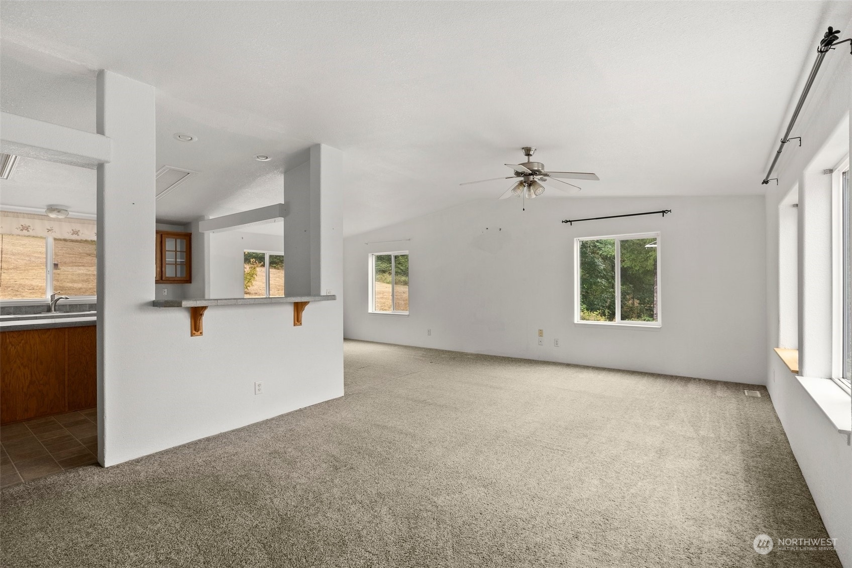 144 Aumick Road Winlock, WA 98596 - Photo 6 of 35 wooden floor in an empty room with a window