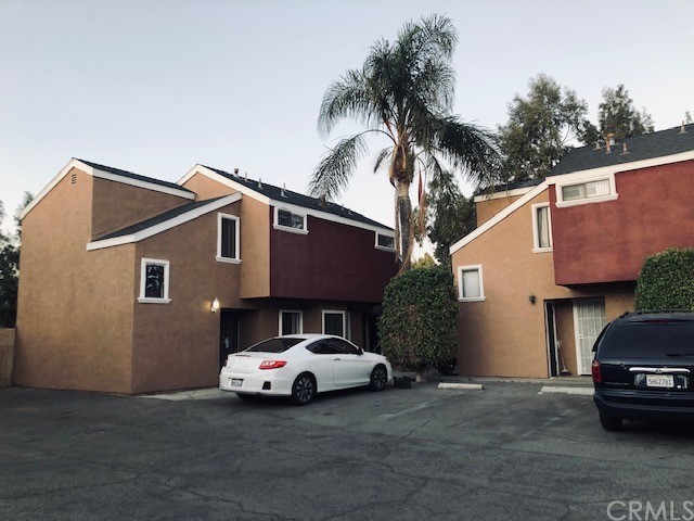 9039 Colony Place Riverside, CA 92503 - Photo 1 of 1 a car parked in front of a house