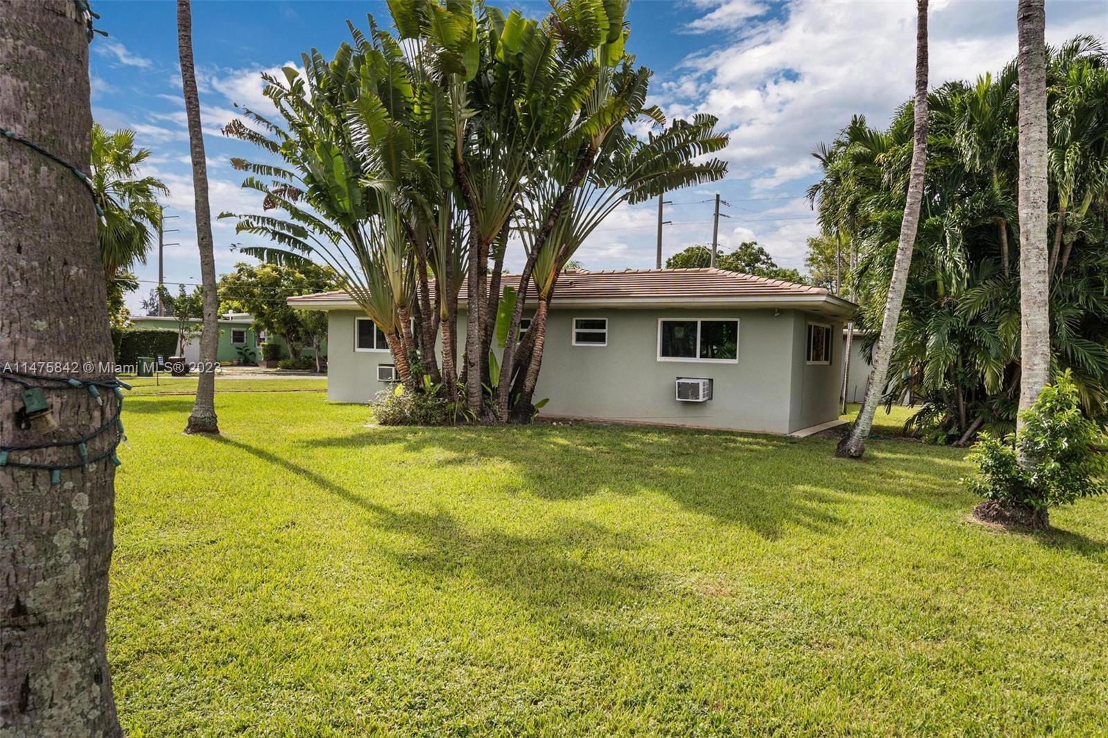 280 Eucalyptus Drive Hialeah, FL 33010 - Photo 13 of 38 a view of outdoor space with trees