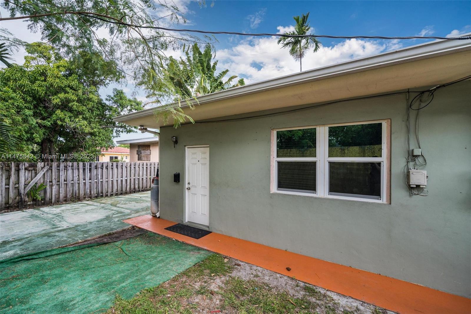 280 Eucalyptus Drive Hialeah, FL 33010 - Photo 15 of 38 a front view of a house with a yard