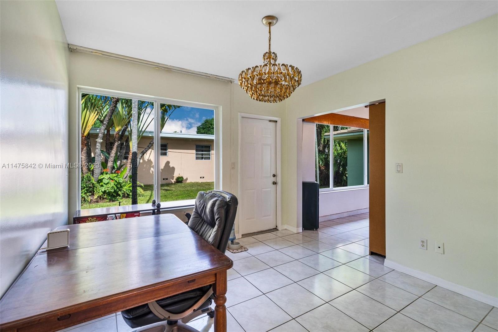 280 Eucalyptus Drive Hialeah, FL 33010 - Photo 22 of 38 a view of a dining room with furniture window and outside view