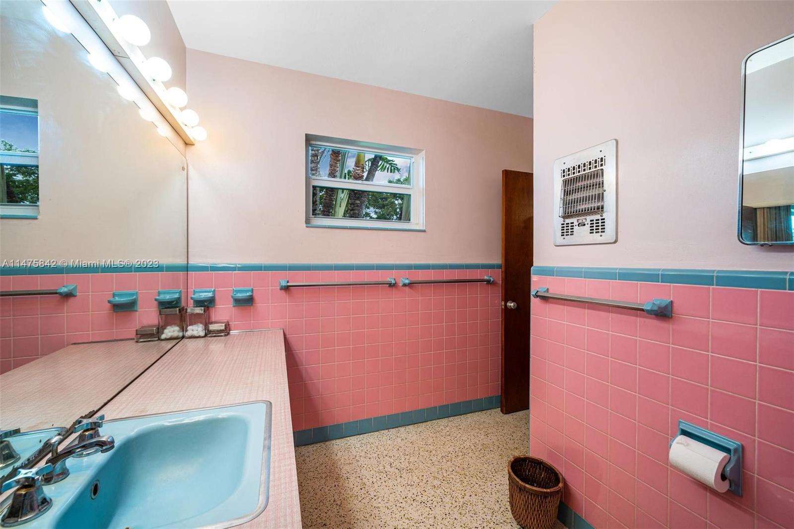 280 Eucalyptus Drive Hialeah, FL 33010 - Photo 31 of 38 a bathroom with a sink and a mirror