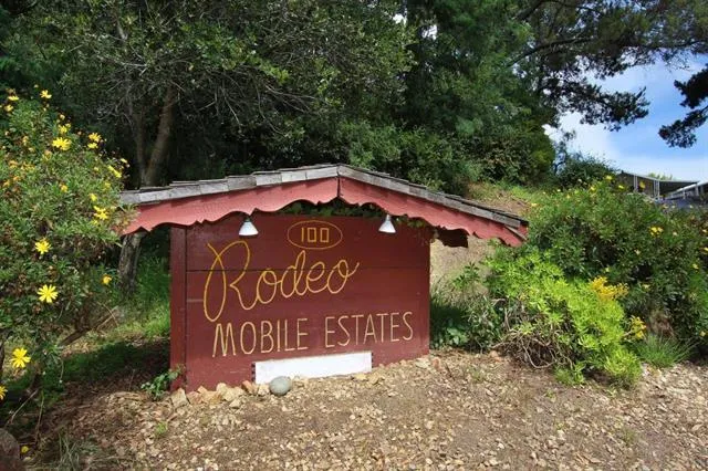 a sign on the side of the road