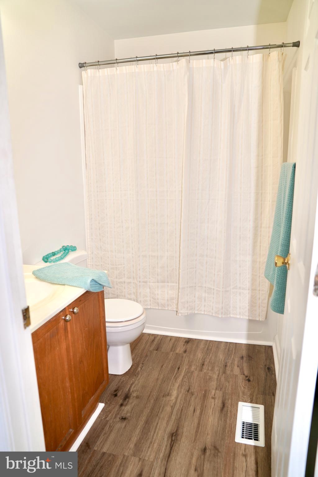 597 Primus Court Frederick, MD 21703 - Photo 16 of 28 Primary Bath w/ New Premium Vinyl Flooring