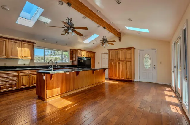 a view of a room with a wooden floor