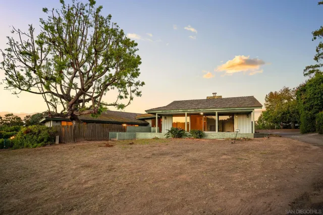 a house view with a garden space