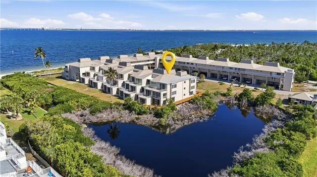 a view of a balcony with chairs