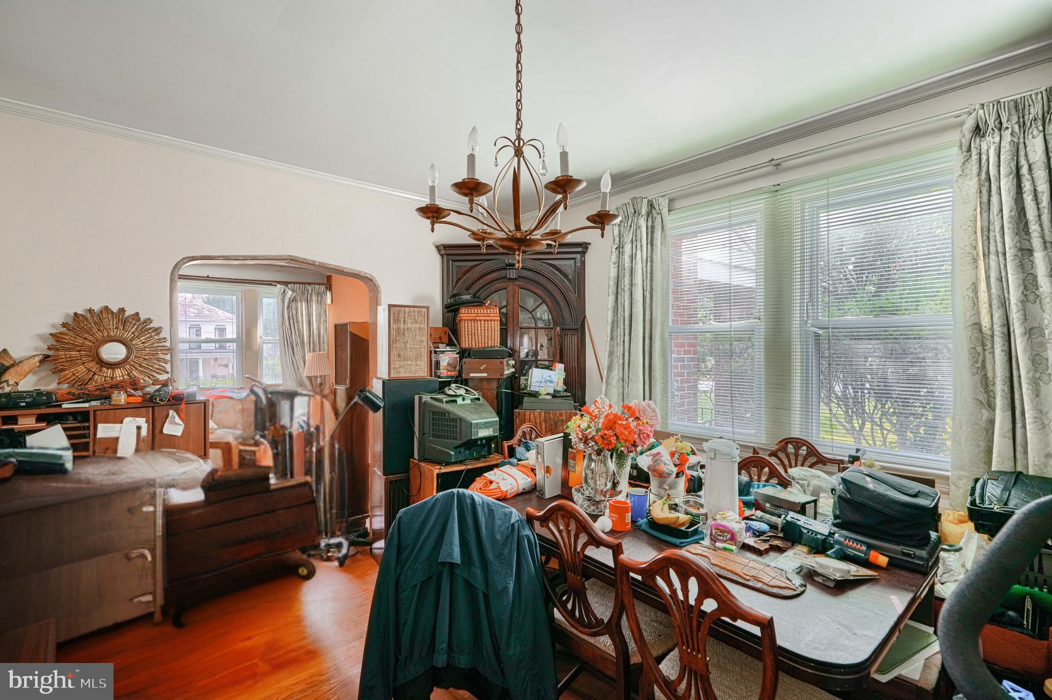 3212 Dorchester Road Baltimore, MD 21215 - Photo 15 of 45 a view of a dining room with furniture window and outside view