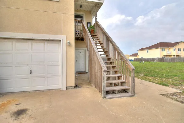 a view of an entryway with stairs