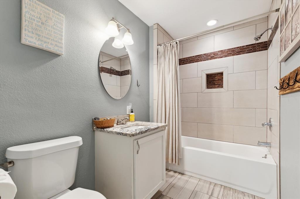 168 Barker Lane Waco, TX 76705 - Photo 14 of 31 a bathroom with a sink toilet and shower