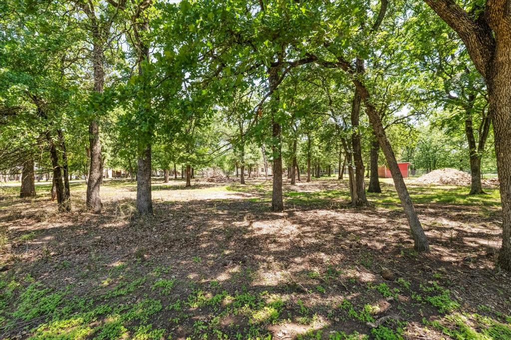 168 Barker Lane Waco, TX 76705 - Photo 27 of 31 a view of outdoor space with trees
