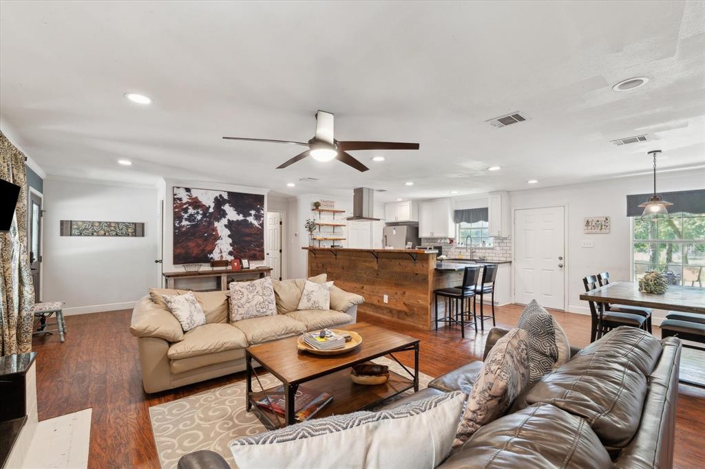168 Barker Lane Waco, TX 76705 - Photo 3 of 31 a living room with furniture kitchen view and a large window