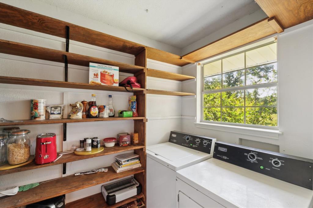168 Barker Lane Waco, TX 76705 - Photo 7 of 31 a kitchen with stainless steel appliances cabinets and a large window