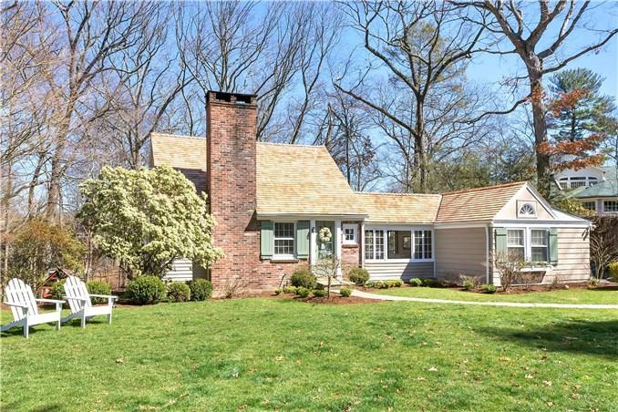 4 Riverview Road Westport, CT 06880 - Photo 1 of 1 a front view of house with yard and green space
