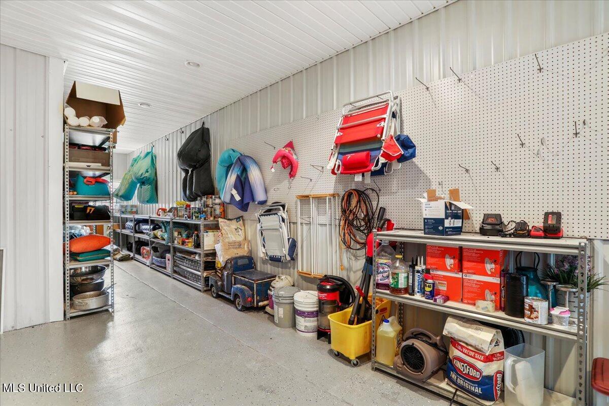 9054 Cleo Smith Road Pass Christian, MS 39571 - Photo 76 of 82 76-Garage Storage