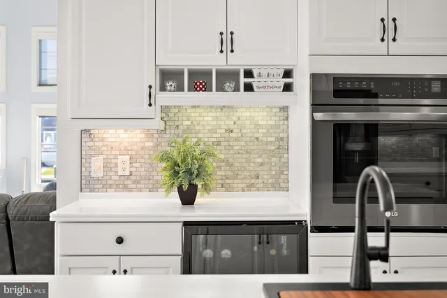 a view of a balcony with two chairs and a table