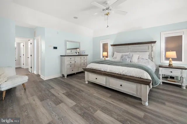 a utility room with cabinets washer and dryer
