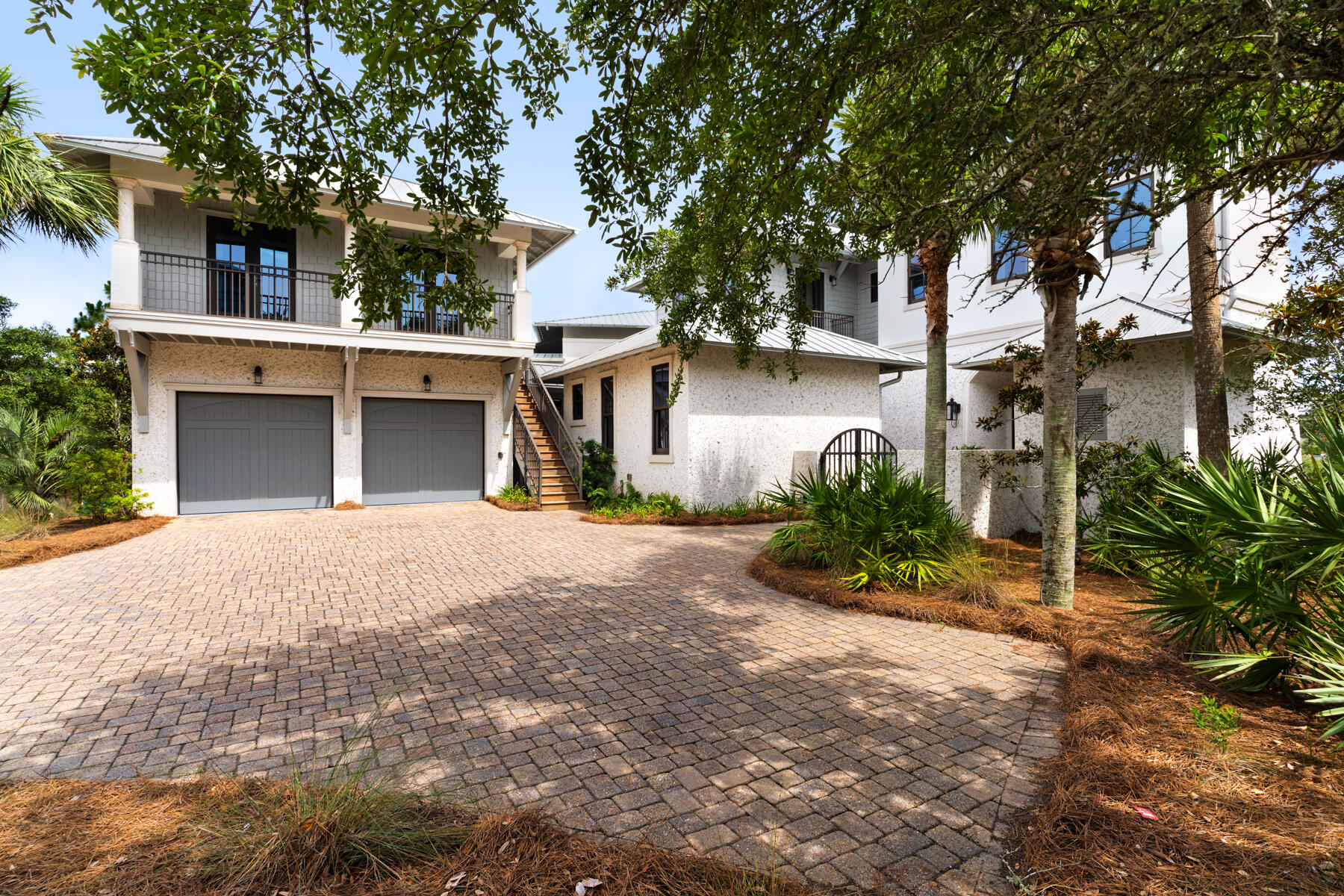 201 West Bermuda Drive Santa Rosa Beach, FL 32459 - Photo 120 of 146 a front view of a house with garden and a tree
