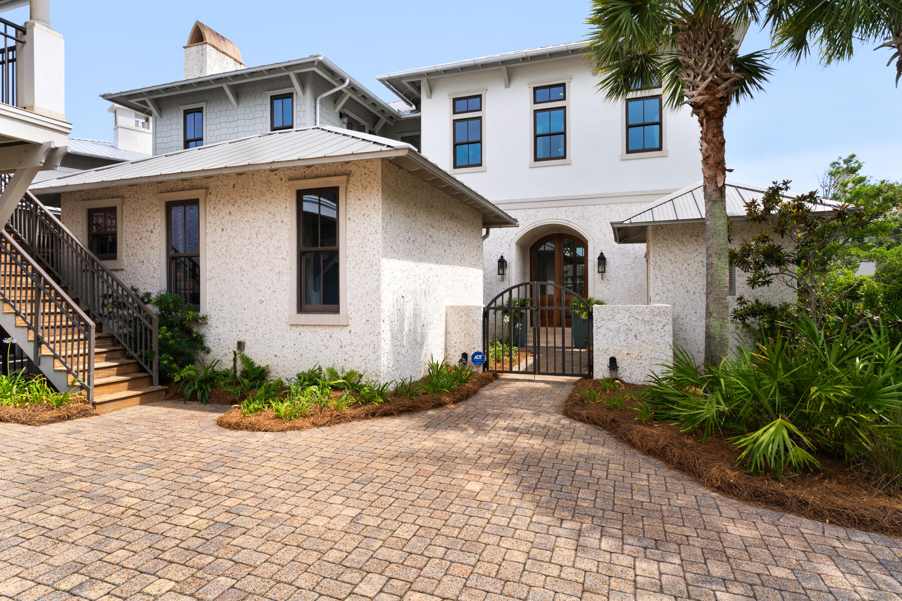 201 West Bermuda Drive Santa Rosa Beach, FL 32459 - Photo 122 of 146 a front view of a house with a yard and potted plants