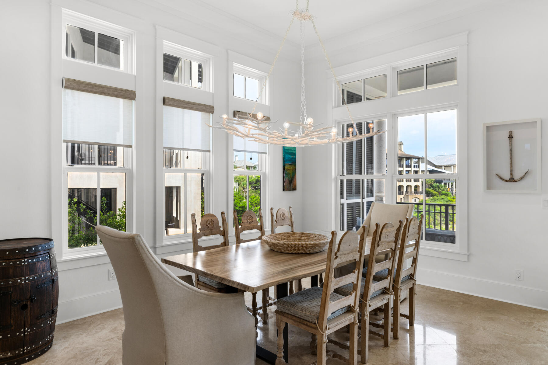 201 West Bermuda Drive Santa Rosa Beach, FL 32459 - Photo 13 of 146 a view of a dining room with furniture window and wooden floor
