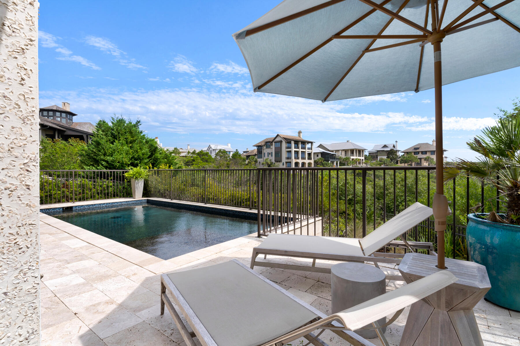 201 West Bermuda Drive Santa Rosa Beach, FL 32459 - Photo 77 of 146 a view of a swimming pool with a lounge chairs
