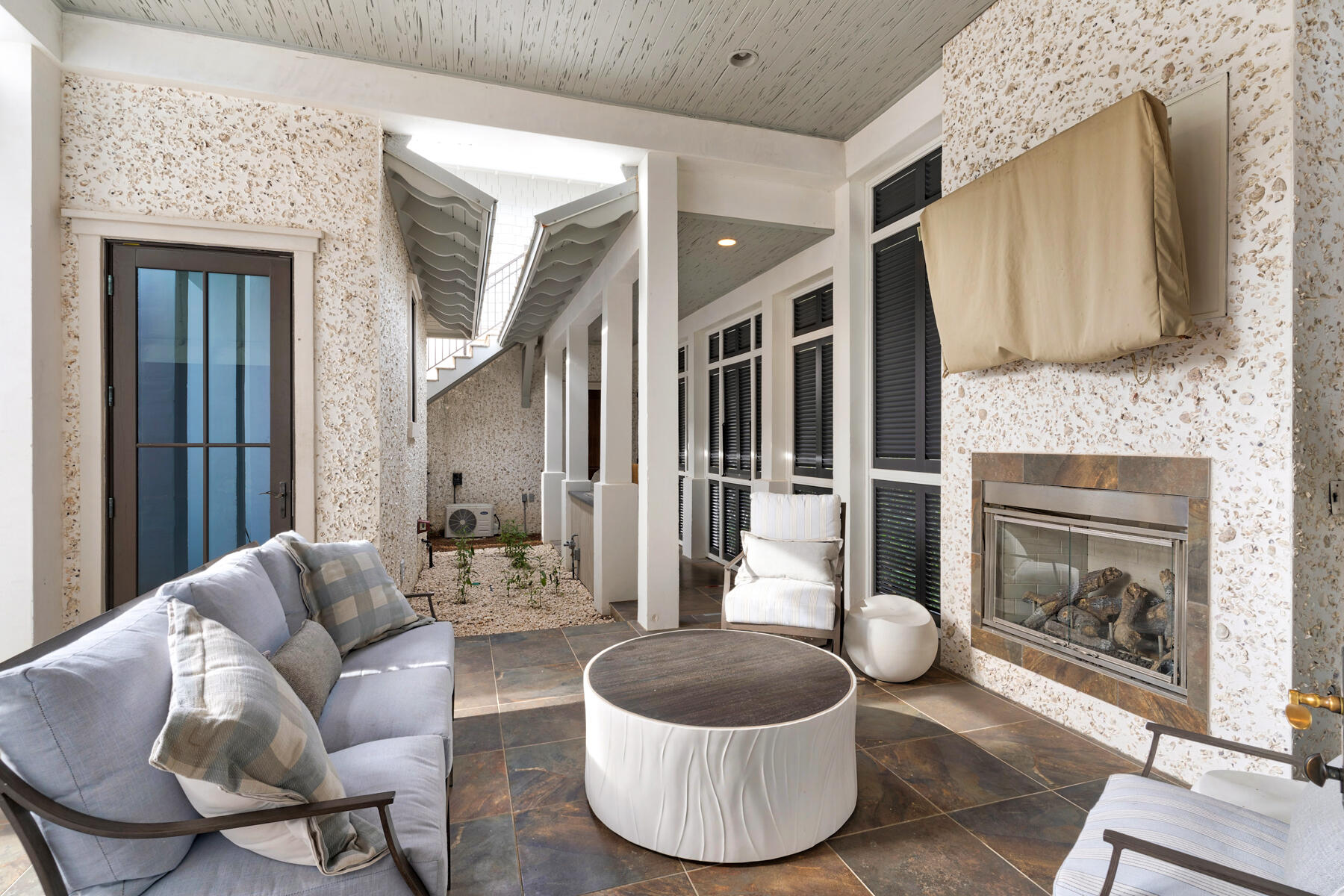 201 West Bermuda Drive Santa Rosa Beach, FL 32459 - Photo 84 of 146 a living room with furniture and a fireplace