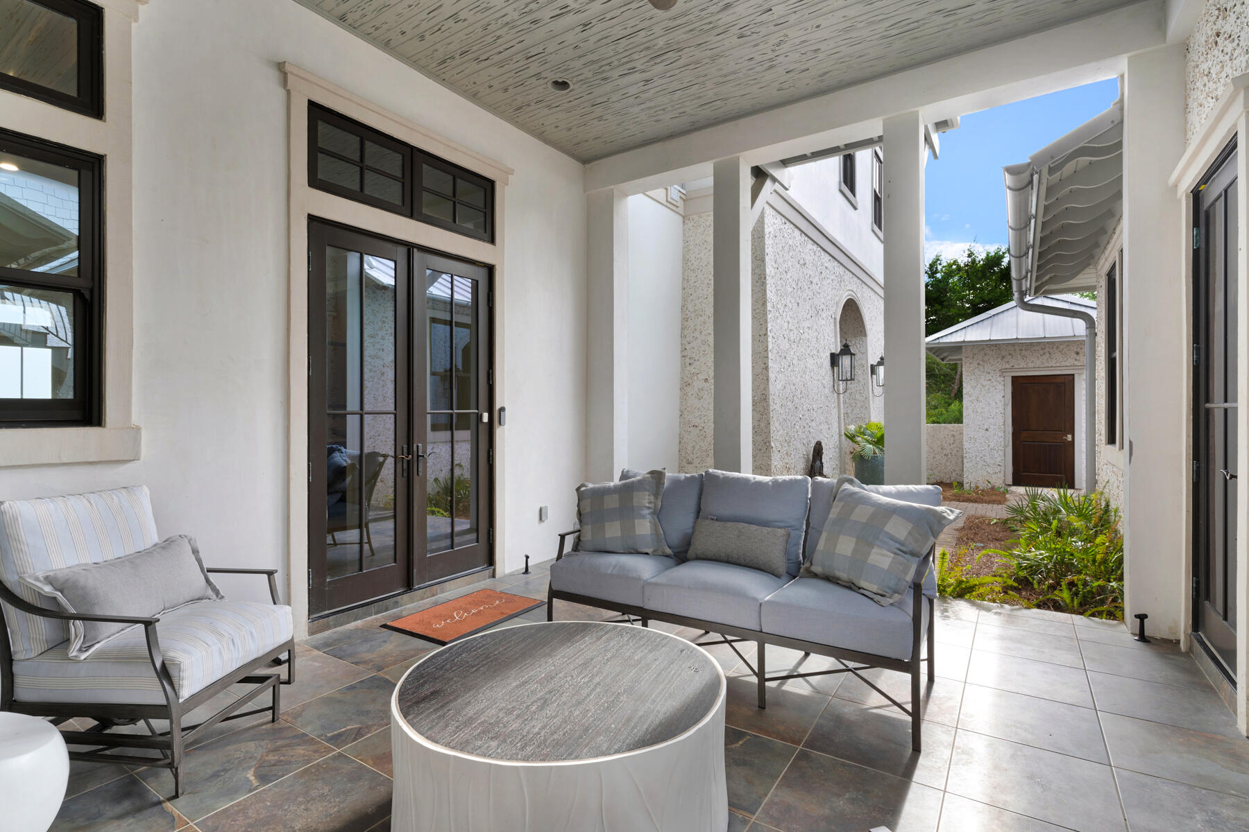 201 West Bermuda Drive Santa Rosa Beach, FL 32459 - Photo 86 of 146 a outdoor space with patio furniture and potted plants