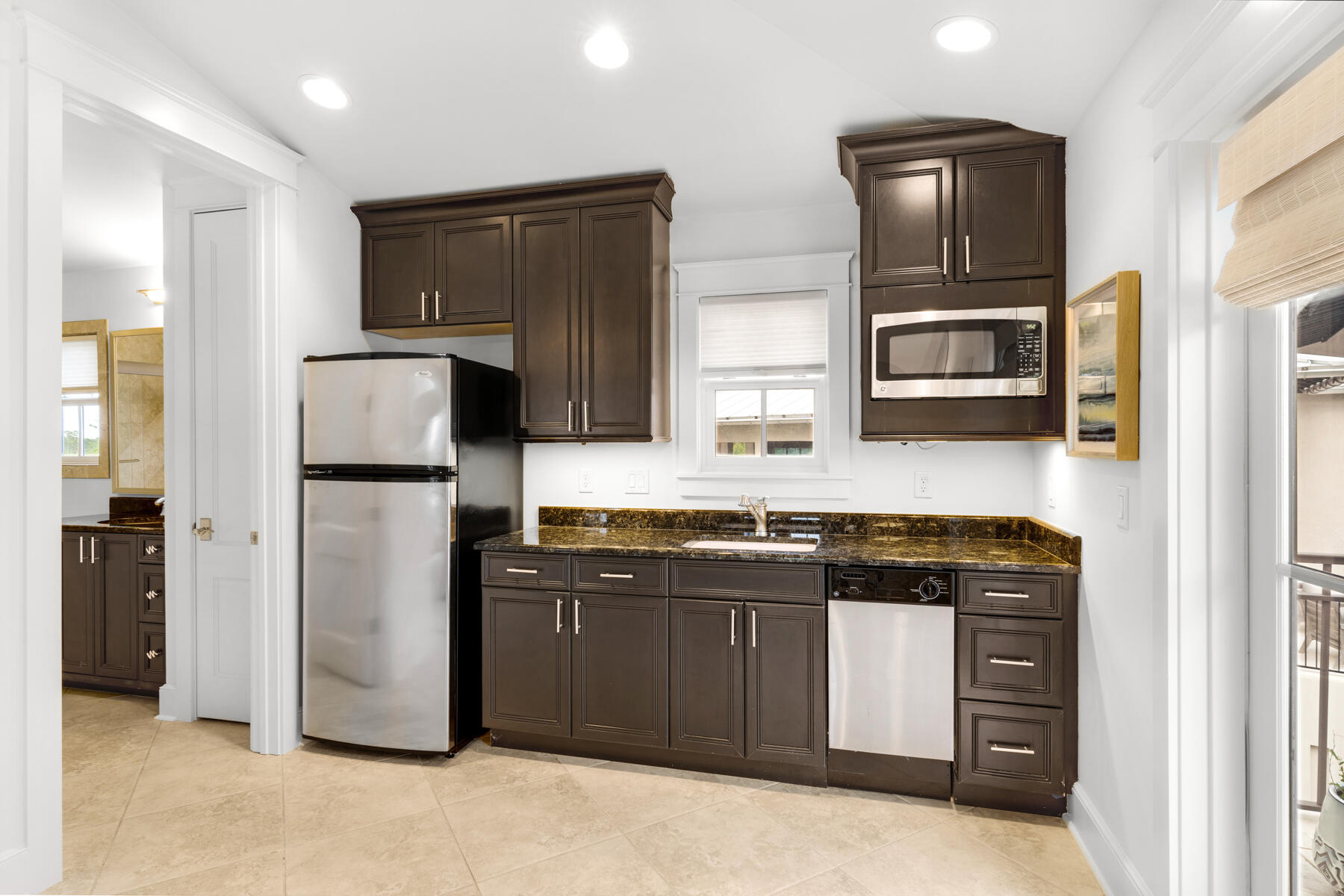 201 West Bermuda Drive Santa Rosa Beach, FL 32459 - Photo 99 of 146 a kitchen with stainless steel appliances granite countertop a refrigerator and a stove