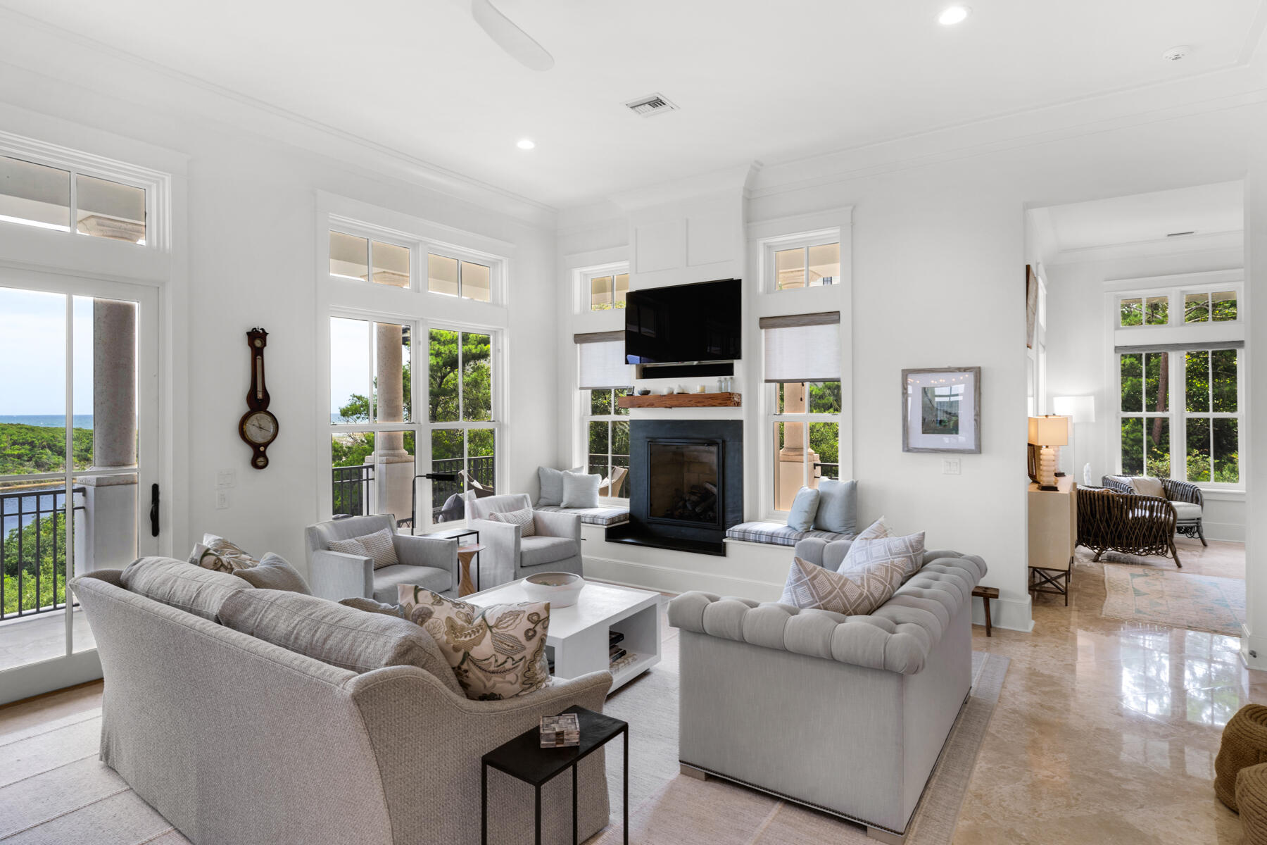 201 West Bermuda Drive Santa Rosa Beach, FL 32459 - Photo 10 of 146 a living room with fireplace furniture and a flat screen tv