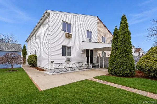 an aerial view of a city with lots of residential buildings