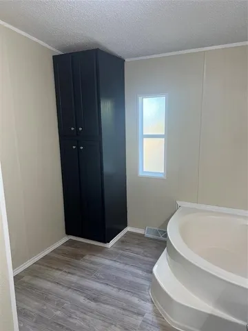 a bathroom with a sink and a bathtub