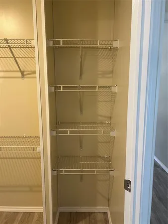 a view of a backyard with a tree