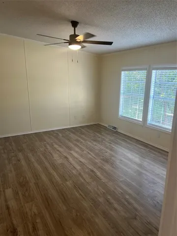 a bathroom with double sink and a mirror