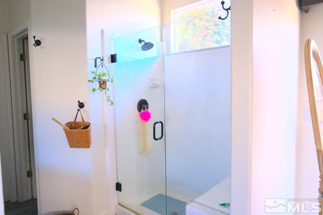 9612 Truckee Meadows Place Reno, NV 89521 - Photo 11 of 29 a bathroom with a shower