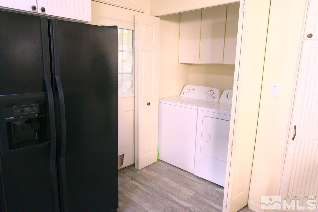 9612 Truckee Meadows Place Reno, NV 89521 - Photo 19 of 29 a view of storage and utility room with wooden floor