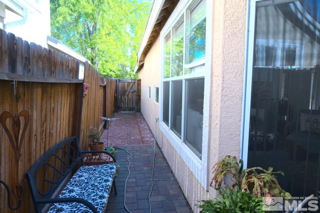 9612 Truckee Meadows Place Reno, NV 89521 - Photo 20 of 29 a view of a pathway with a potted plants