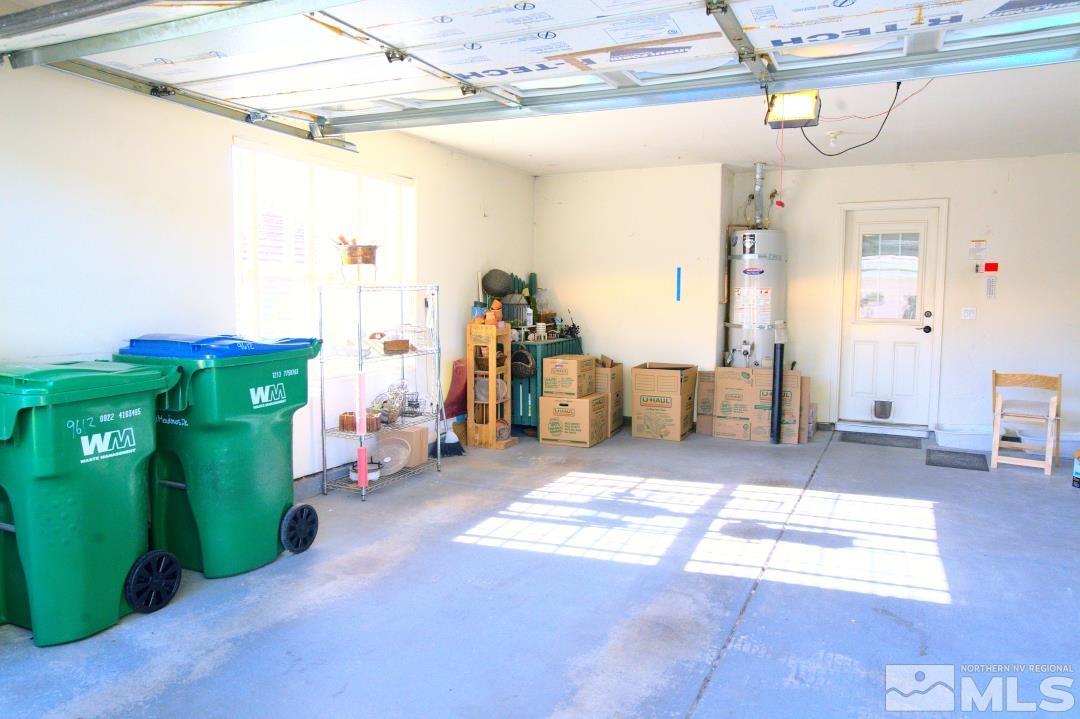 9612 Truckee Meadows Place Reno, NV 89521 - Photo 24 of 29 a view of a livingroom with furniture and a chandelier