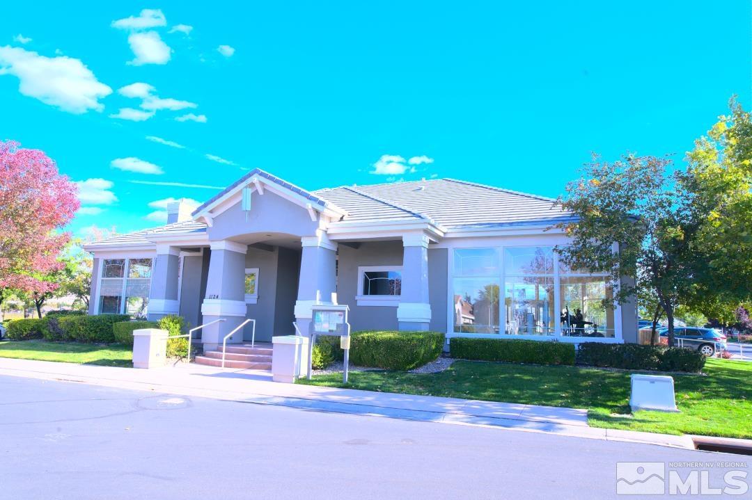 9612 Truckee Meadows Place Reno, NV 89521 - Photo 26 of 29 a front view of house with yard and green space