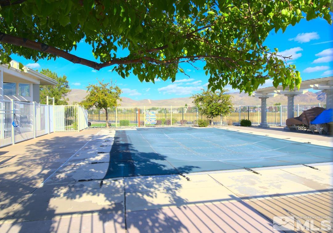 9612 Truckee Meadows Place Reno, NV 89521 - Photo 27 of 29 a view of a yard with an tree