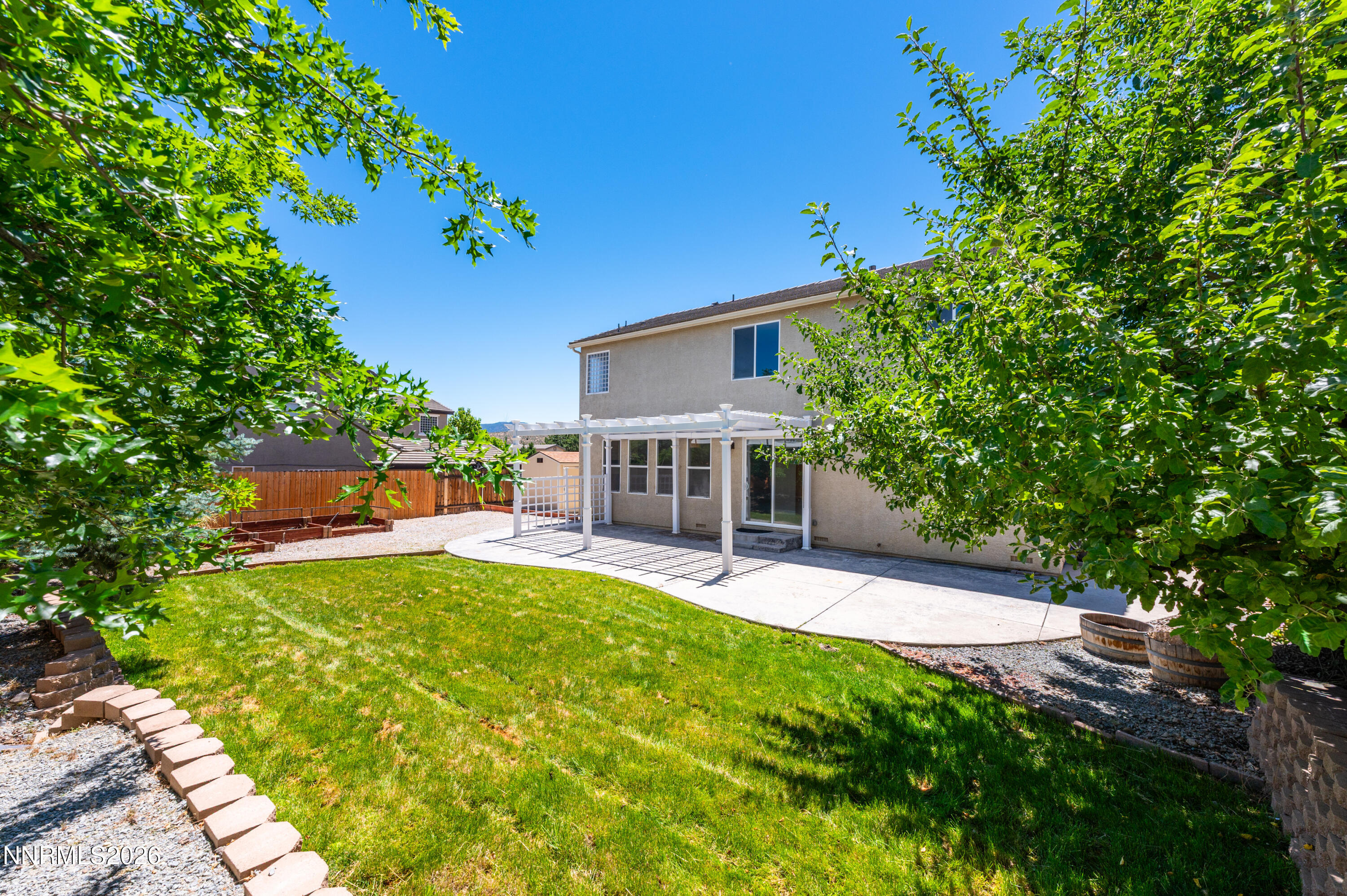 1770 Kodiak Circle Reno, NV 89511 - Photo 30 of 32 a house view with a sitting space and garden view