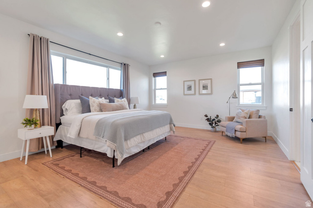1820 West Farmhouse Flats Road Peoa, UT 84061 - Photo 22 of 79 Spacious room featuring light wood-finish flooring and ample natural light from multiple windows