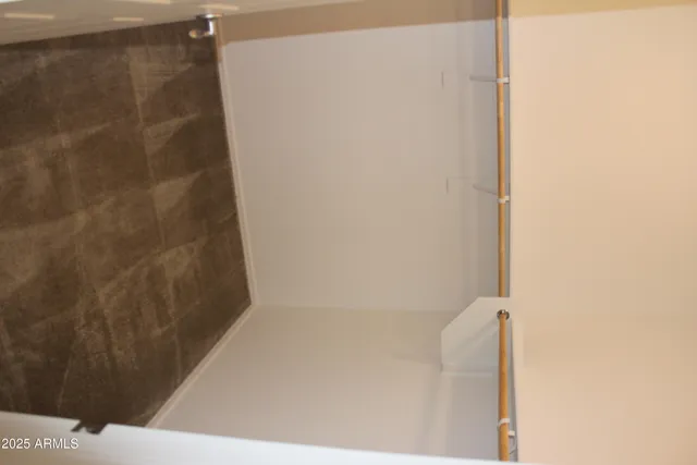 a view of small space with racks on the wall