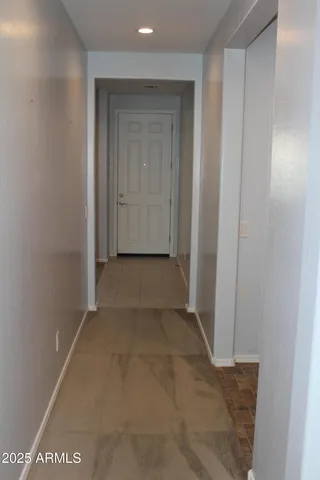 a view of a bathroom with mirror