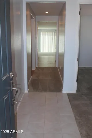 a kitchen with stainless steel appliances a sink stove and refrigerator