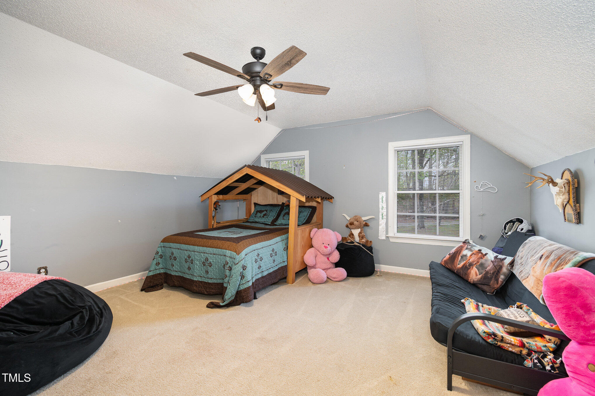 472 Jesse Phillips Road Robbins, NC 27325 - Photo 24 of 36 a bedroom with furniture and a window