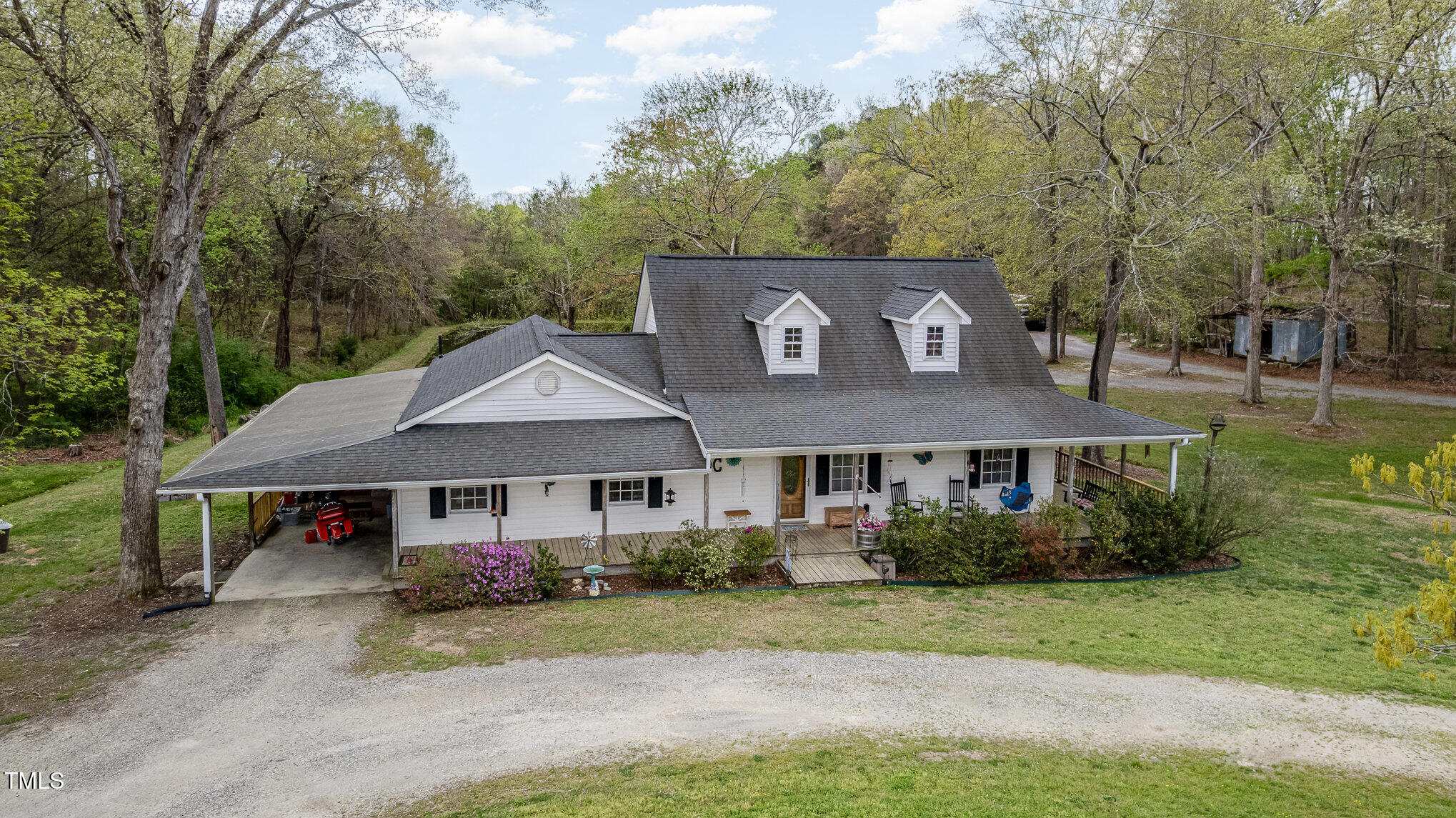 472 Jesse Phillips Road Robbins, NC 27325 - Photo 3 of 36 a front view of a house with a yard