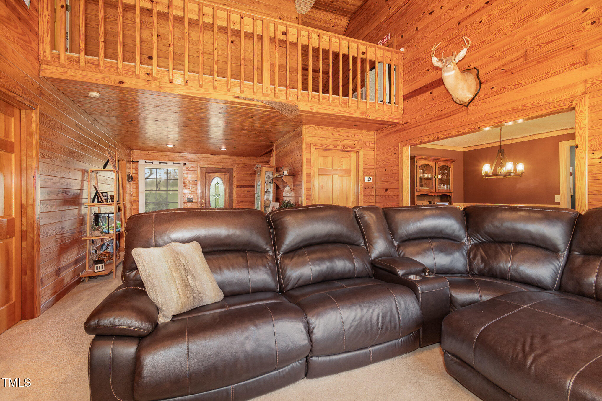472 Jesse Phillips Road Robbins, NC 27325 - Photo 9 of 36 a large living room with a couch